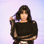 Alinne Garruth announces debut album, “Fim de Festa”