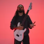 ESHTADUR’s New Guitar Playthrough Unleashes The Wisdom of “Fire Above Mountain Below”